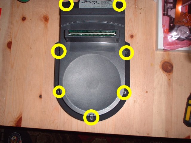 Underside of CD unit, screw locations marked on picture